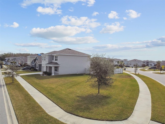 view of property exterior with a lawn and a garage