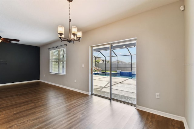 unfurnished room with wood-type flooring and ceiling fan with notable chandelier