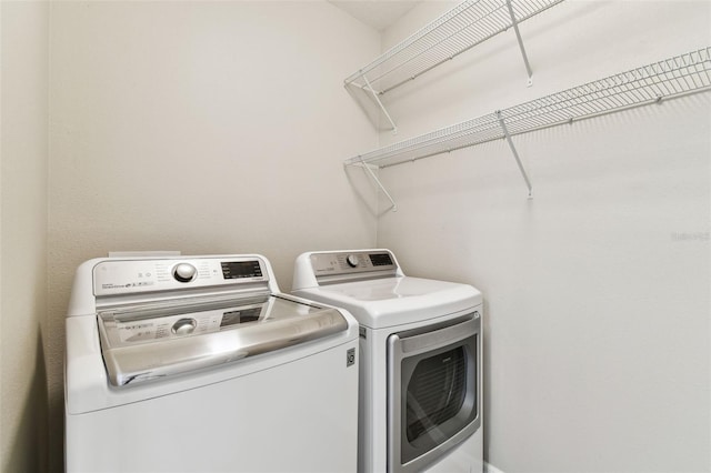 laundry area with washer and dryer