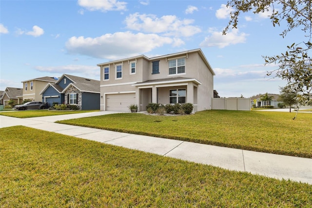 view of front of property with a garage and a front lawn