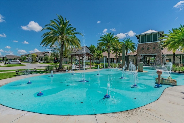 view of swimming pool featuring a gazebo