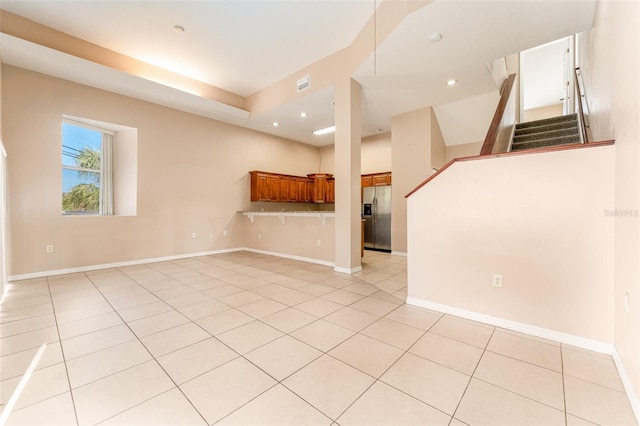 interior space with light tile patterned floors