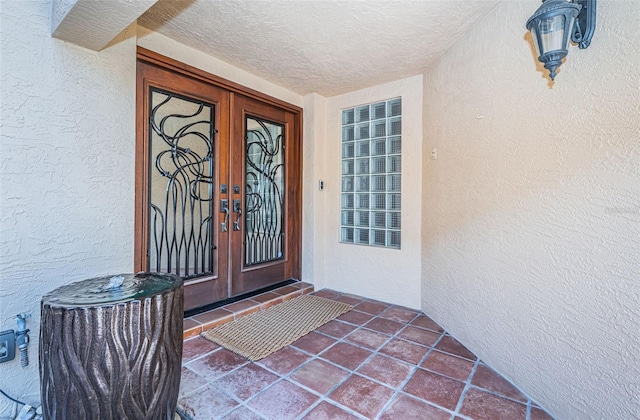 doorway to property featuring french doors