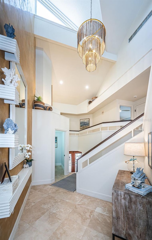 interior space featuring an inviting chandelier and lofted ceiling