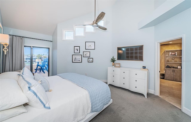 bedroom with high vaulted ceiling, light colored carpet, and ceiling fan