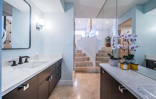 bathroom featuring vanity and tile patterned flooring