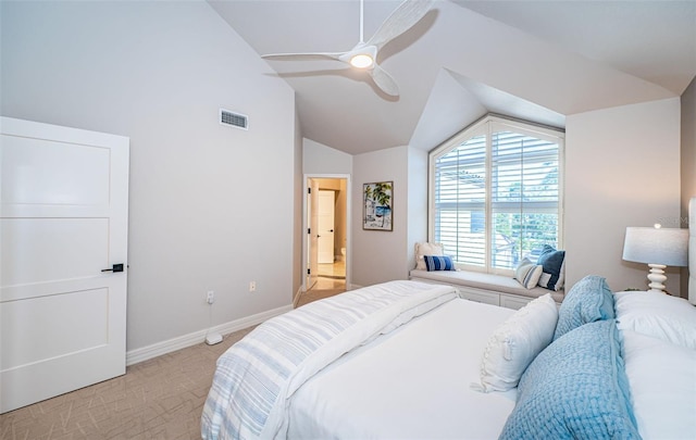 carpeted bedroom featuring lofted ceiling and ceiling fan