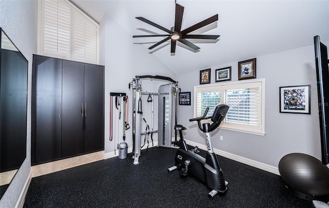 workout area featuring lofted ceiling and ceiling fan