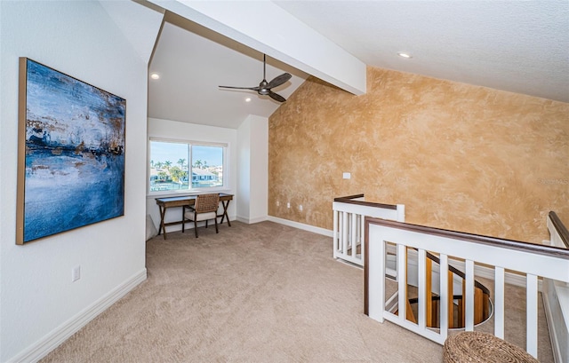 corridor with light colored carpet and lofted ceiling with beams