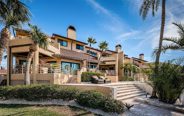 exterior space with an outdoor hangout area