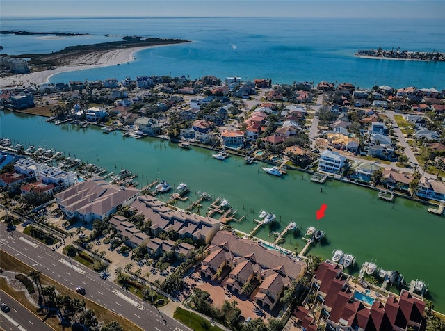 aerial view with a water view and a view of the beach