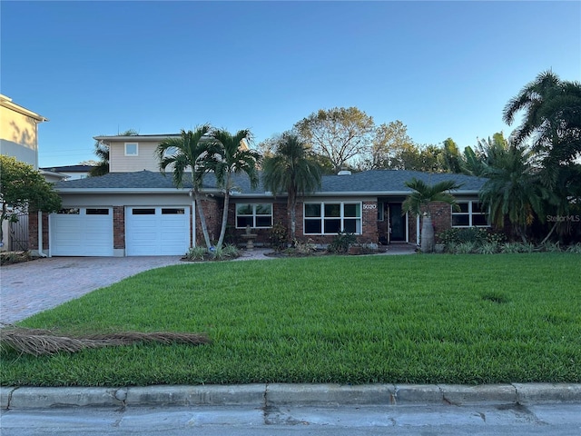 view of front of property with a front lawn