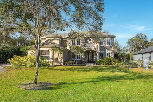 view of front facade with a front yard