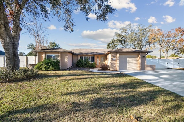 view of front facade with a front lawn and a garage