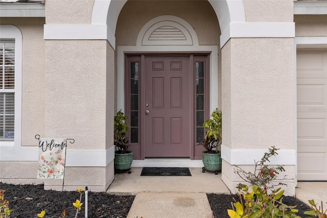 entrance to property with a garage