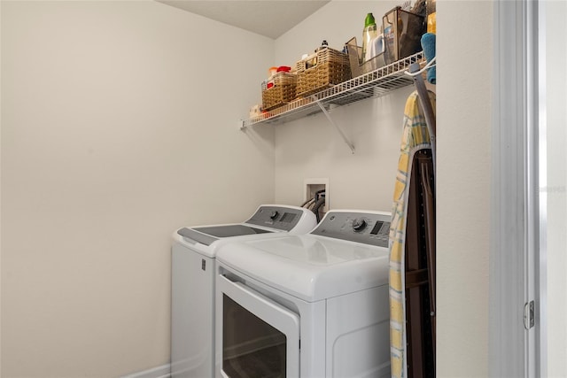 laundry area featuring independent washer and dryer