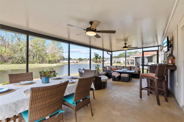 sunroom / solarium with ceiling fan