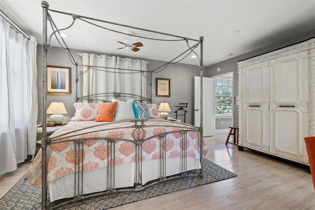 bedroom with light hardwood / wood-style floors