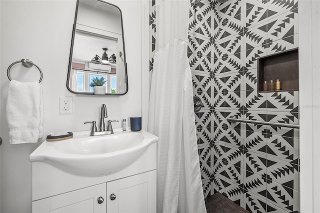 bathroom featuring vanity and walk in shower