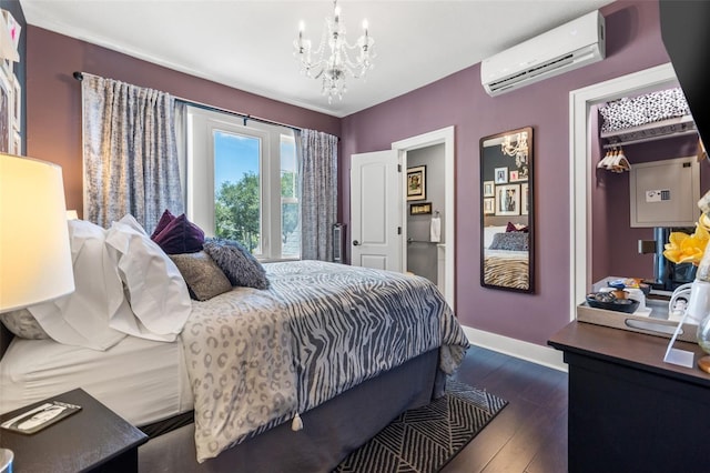 bedroom with a wall unit AC, dark hardwood / wood-style flooring, and a chandelier