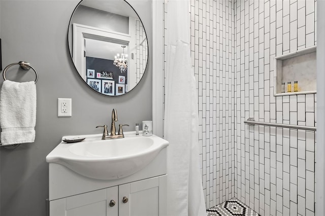 bathroom with a shower with curtain and vanity