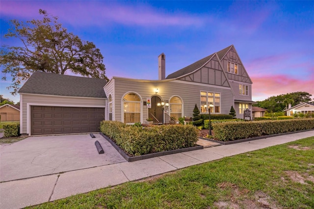 view of front of property with a garage