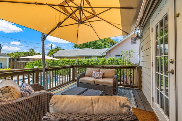 deck featuring an outdoor hangout area