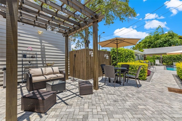 view of patio with an outdoor living space, a pergola, and a fenced in pool