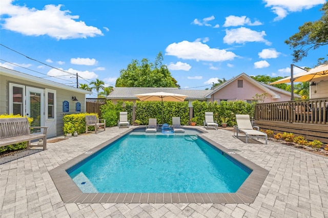 view of pool featuring a patio area