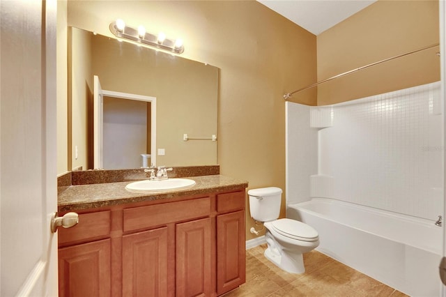 full bathroom with tile patterned flooring, shower / tub combination, vanity, and toilet