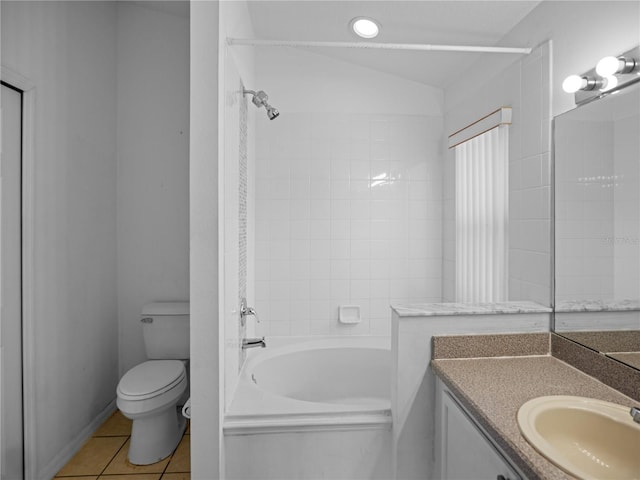 full bathroom featuring vanity, vaulted ceiling, shower / bathing tub combination, tile patterned flooring, and toilet