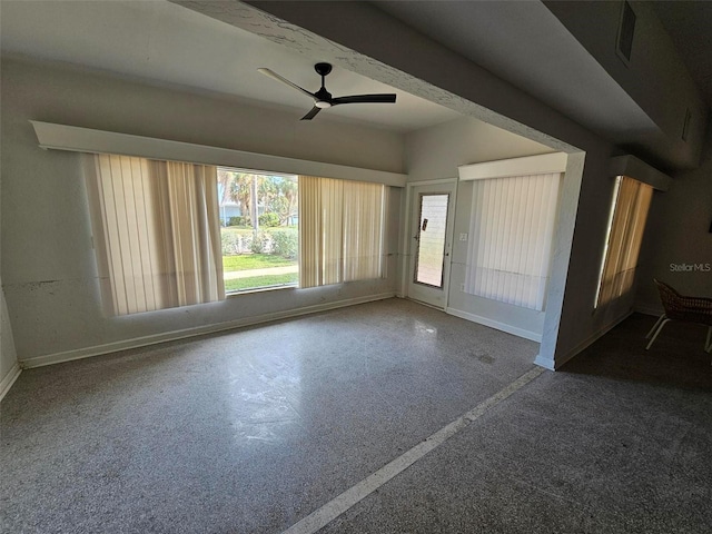 unfurnished room with ceiling fan