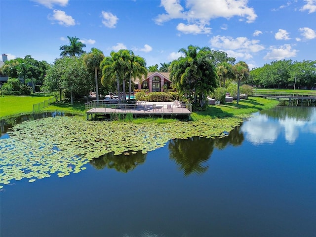 view of home's community featuring a water view