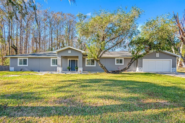 ranch-style house with a front yard and a garage