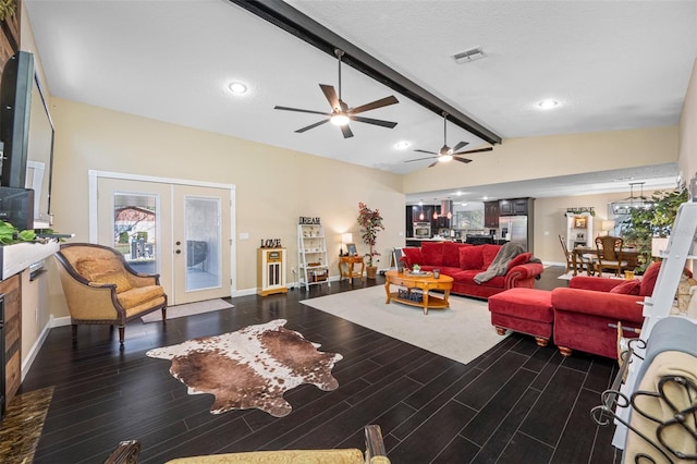 living room with vaulted ceiling with beams, baseboards, visible vents, a ceiling fan, and wood finished floors