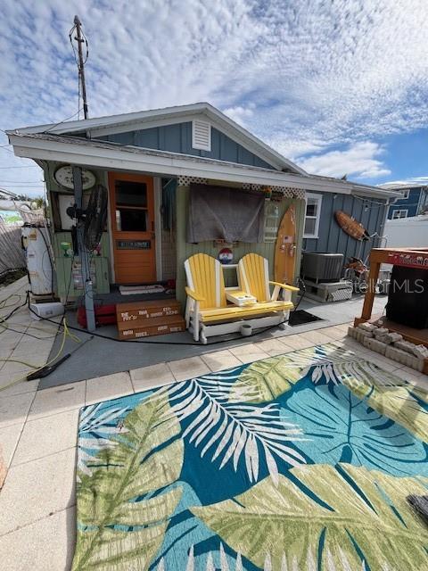 back of house featuring a patio