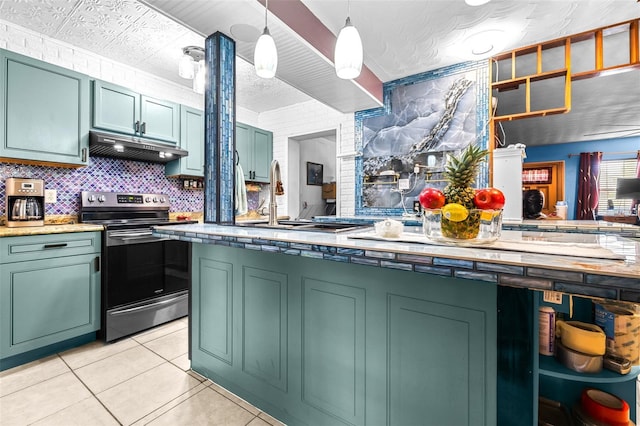 kitchen featuring pendant lighting, stainless steel range with electric cooktop, green cabinets, sink, and light tile patterned flooring