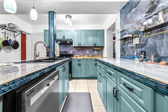 kitchen featuring sink, stainless steel appliances, brick wall, decorative backsplash, and light tile patterned flooring