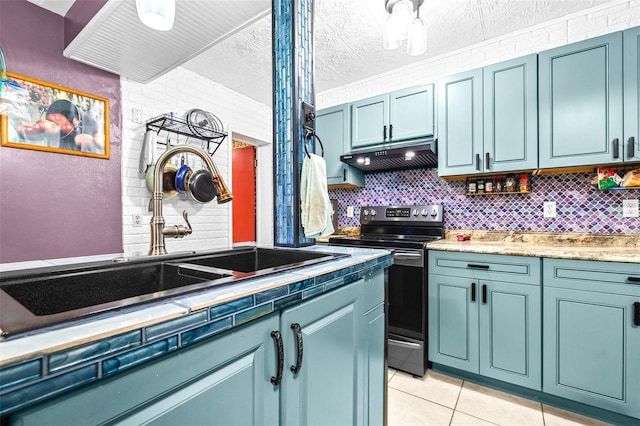 kitchen with backsplash, sink, a textured ceiling, and stainless steel electric range