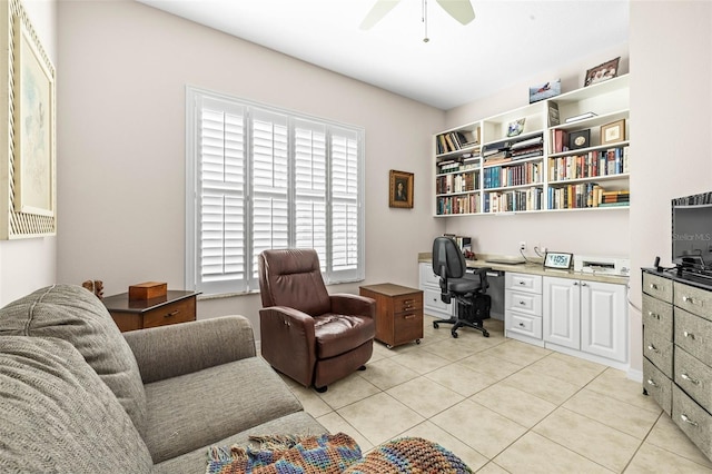 tiled office space with ceiling fan