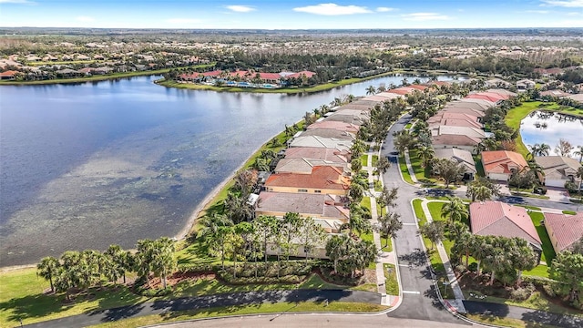 drone / aerial view with a water view