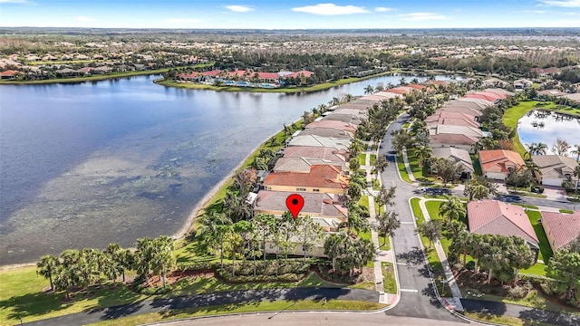 drone / aerial view with a water view