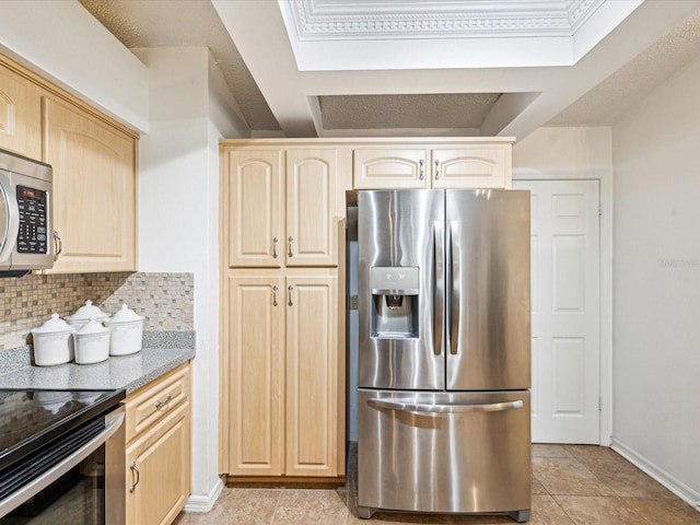 kitchen featuring decorative backsplash, light brown cabinets, crown molding, and appliances with stainless steel finishes