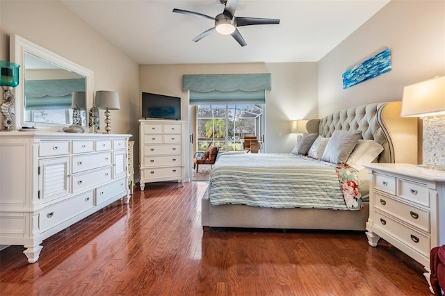 bedroom featuring ceiling fan and dark hardwood / wood-style flooring