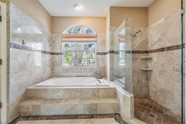 bathroom featuring plus walk in shower