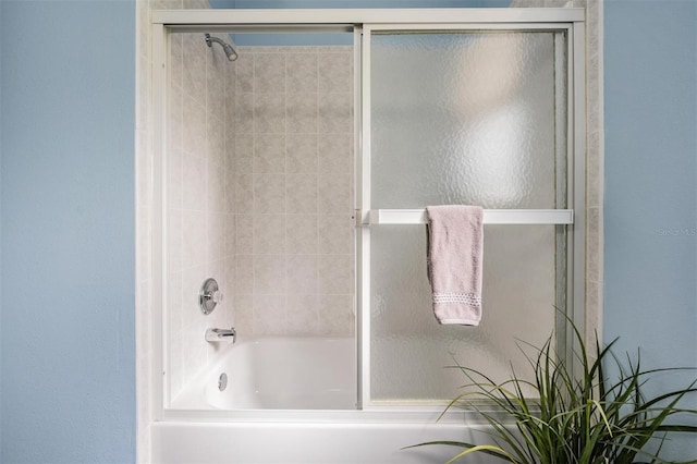 bathroom featuring enclosed tub / shower combo