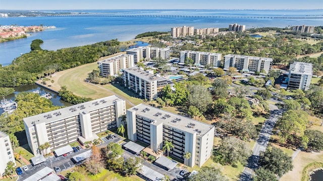 birds eye view of property featuring a water view