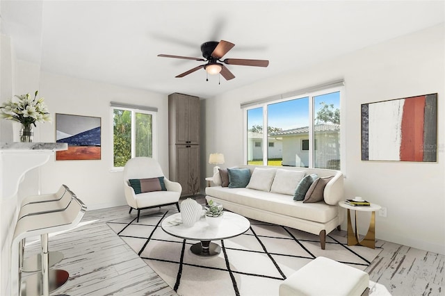 living room with ceiling fan