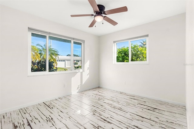 empty room featuring ceiling fan