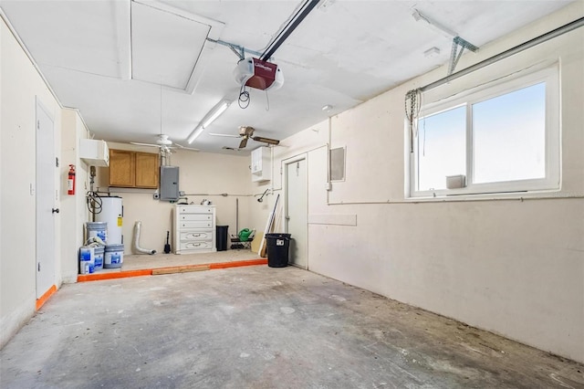 garage with electric panel, a garage door opener, ceiling fan, and water heater